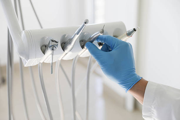 Professional Tooth Extraction technician working in Tri-Lakes, IN